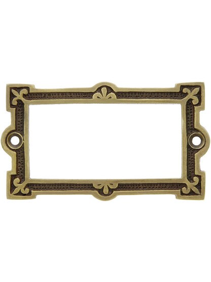 Fleur de Lis Label Holder in Antique Brass.